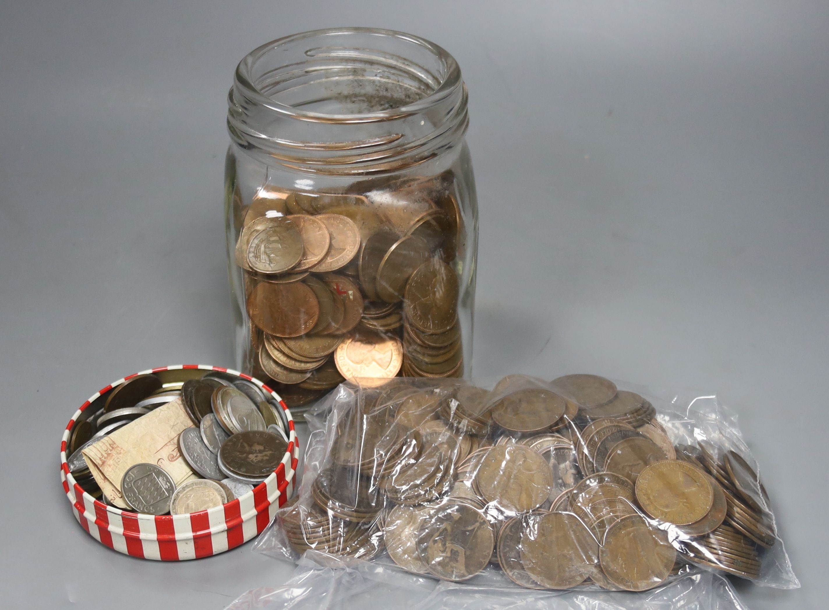 A group of UK pennies and half pennies and 20th century European coins